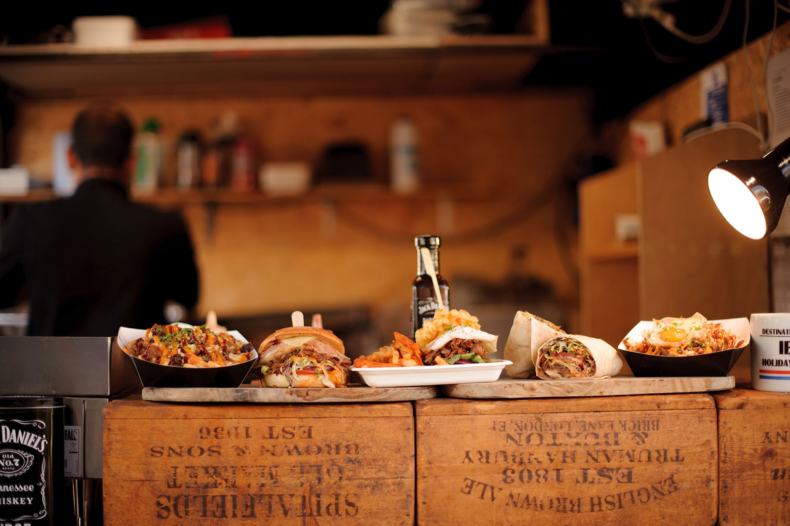 Display of pub food sitting on wooden boxes
