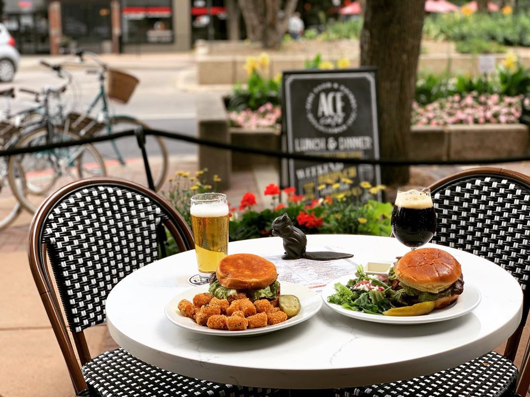 Ace Cafe burger and a beer on patio table