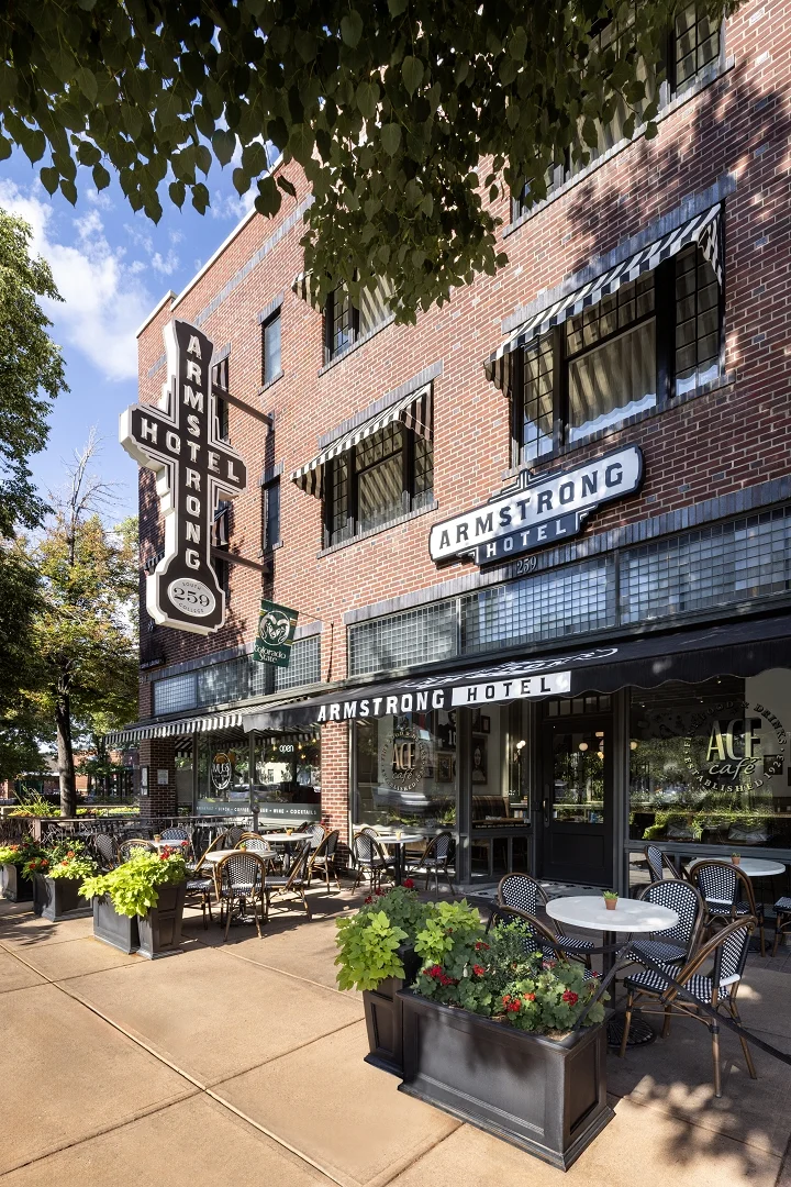 Armstrong Hotel exterior with outdoor café seating